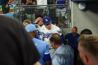 Dugout Drama: Freeman Escapes Serious Harm in Scary Tumble